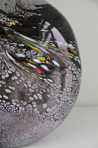 Brown landscape vase with white, yellow, green and red detail