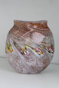 Cream, orange, brown vase with yellow, green and purple detail