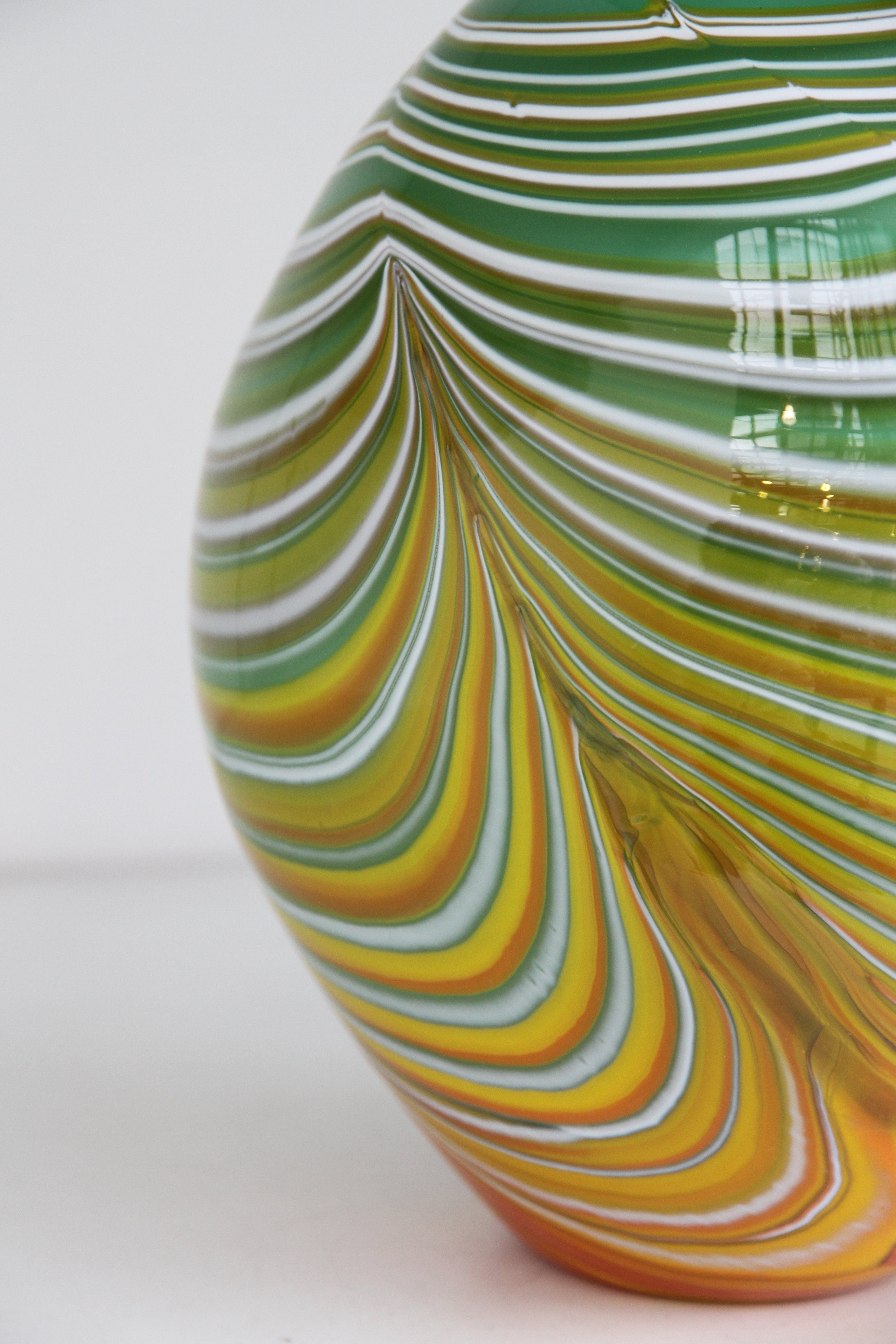 Green Vase with White, yellow and orange swirls