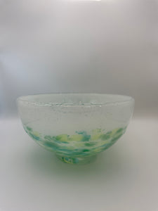 White bowl with green dots